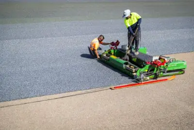 Laying TigerTurf Ecocept Base