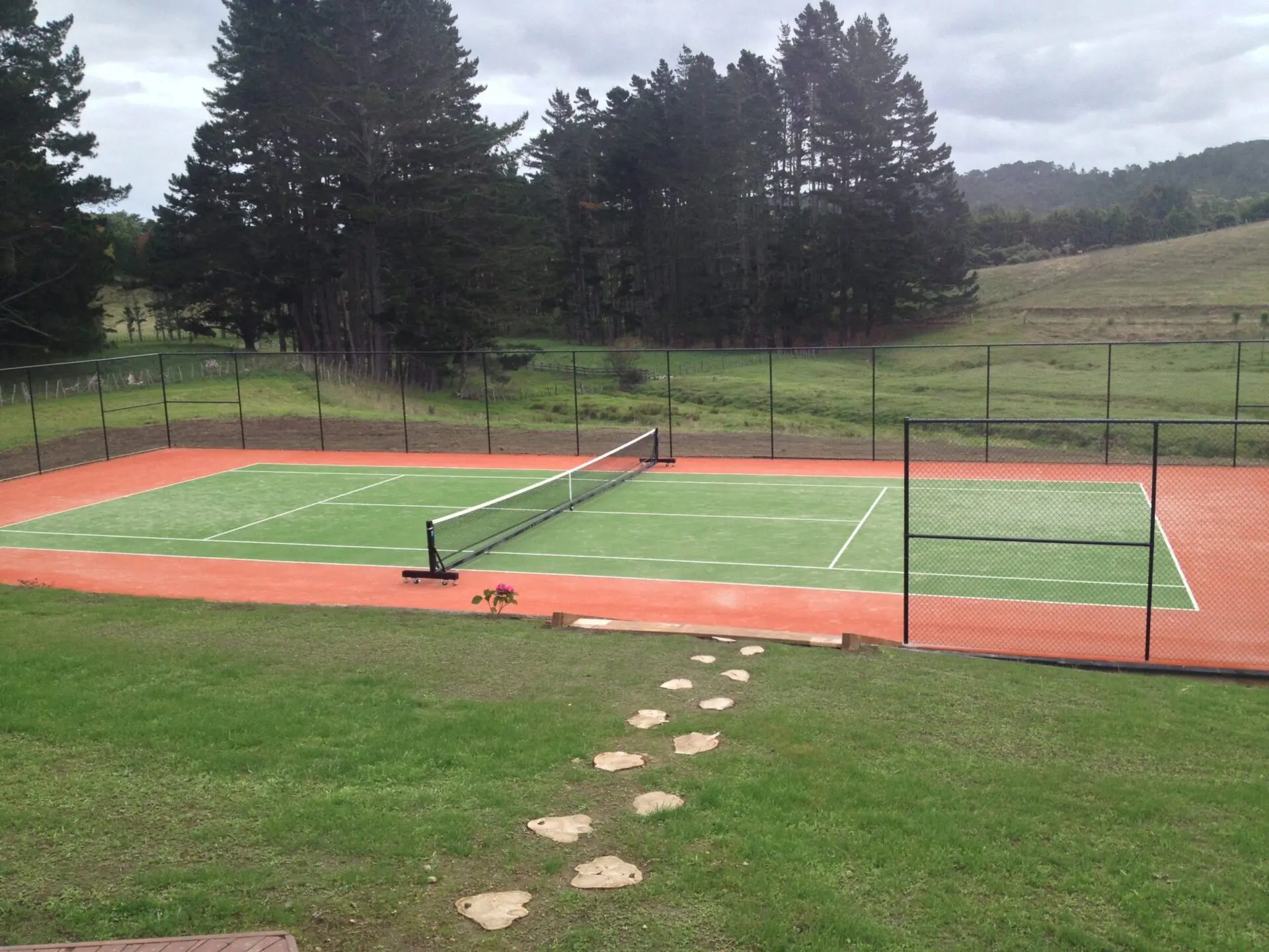 Synthetic grass tennis court