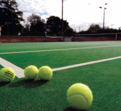 The Expert Guide to Sports Turf 4 A tennis ball is on a tennis court
