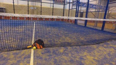 TigerTurf's definitive guide to Padel 6 Image of an indoor blue padel court